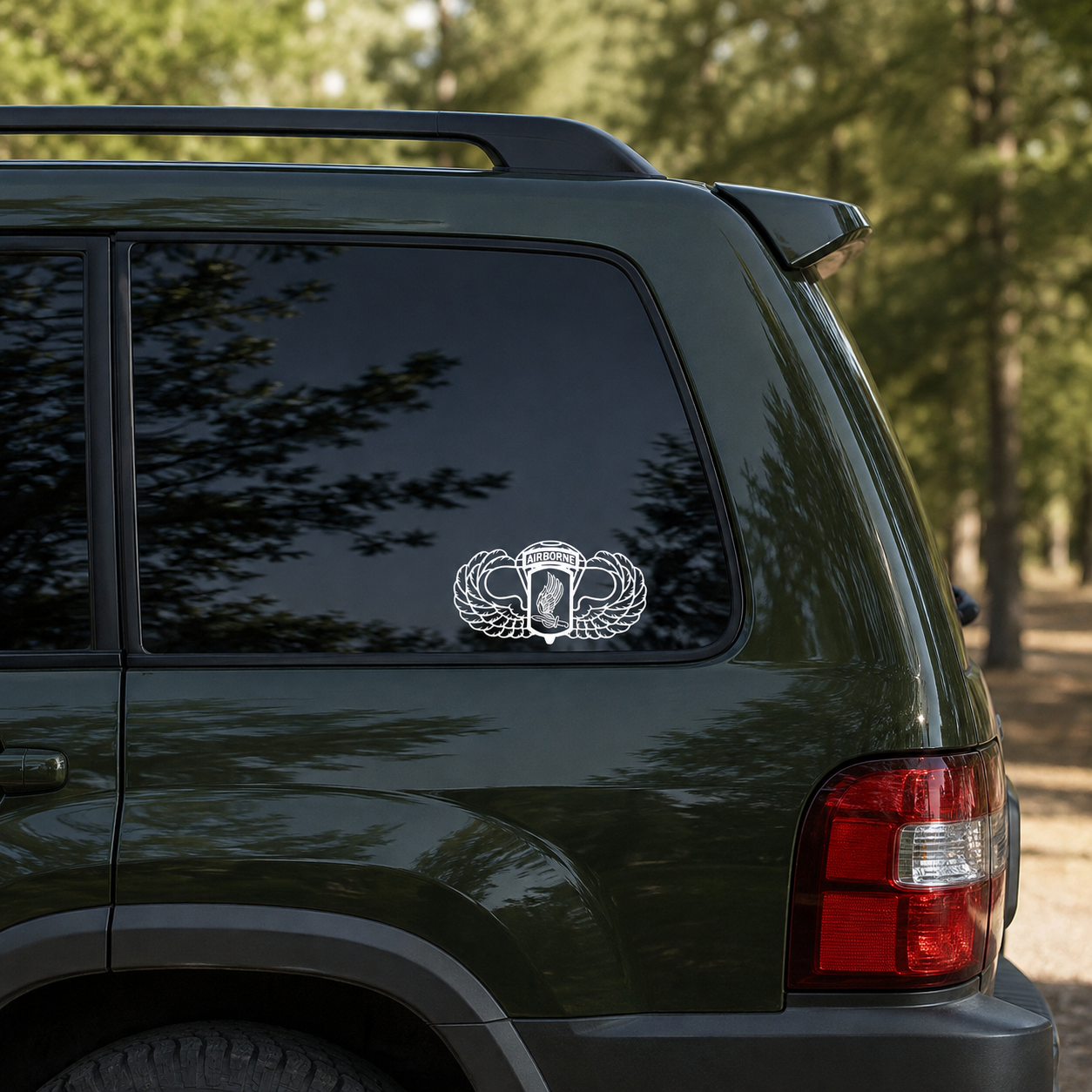 173rd Airborne with Basic Wings vinyl decal displayed on a dark tinted SUV window