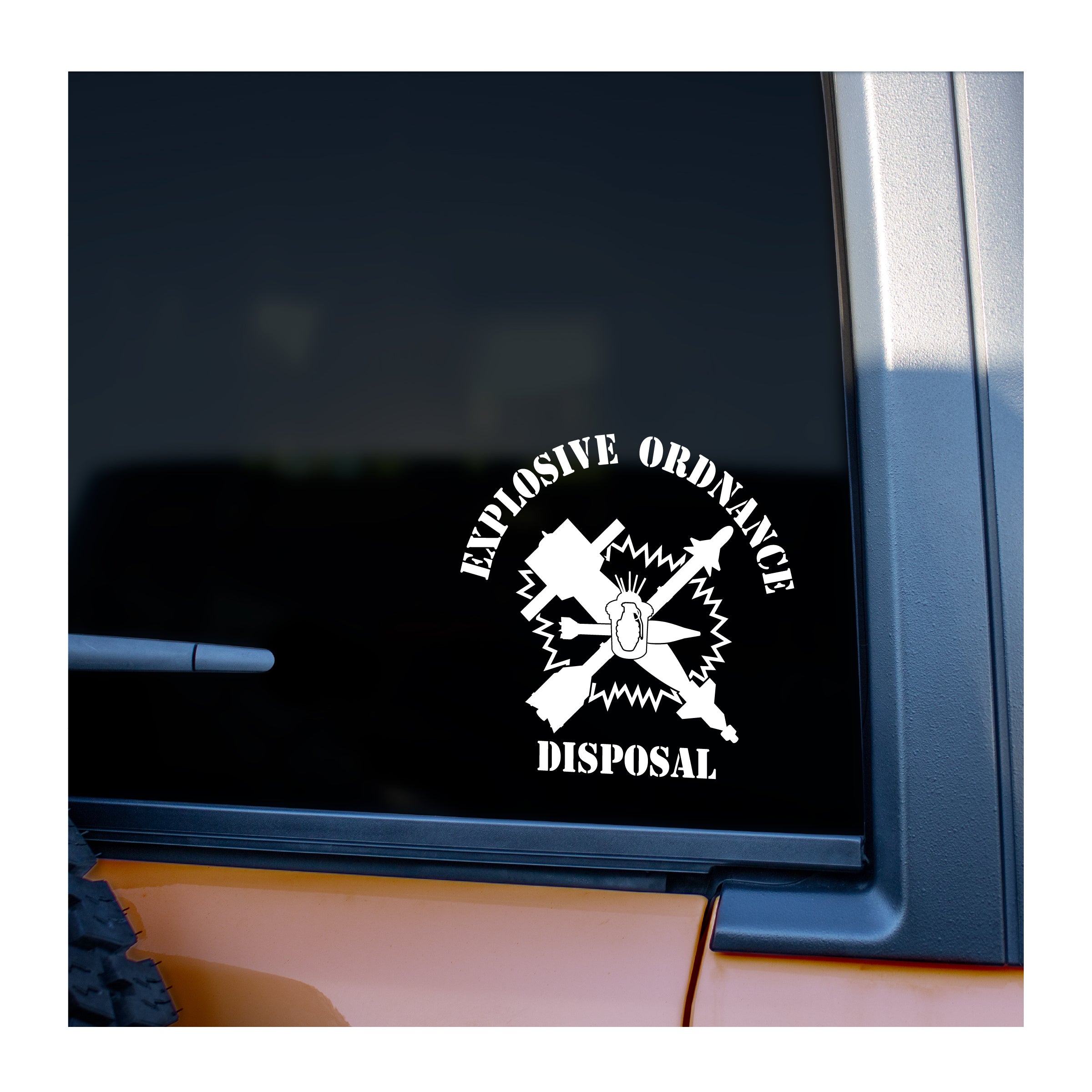 Decal with 'Explosive Ordnance Disposal' text and symbols on a car window.
