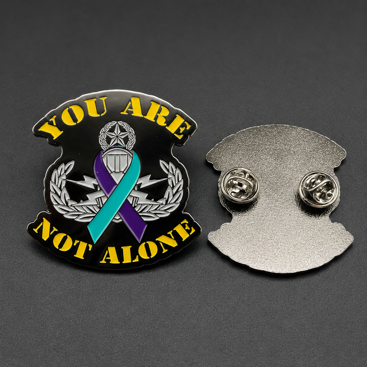 Front and back close-up of EOD You Are Not Alone suicide awareness pin