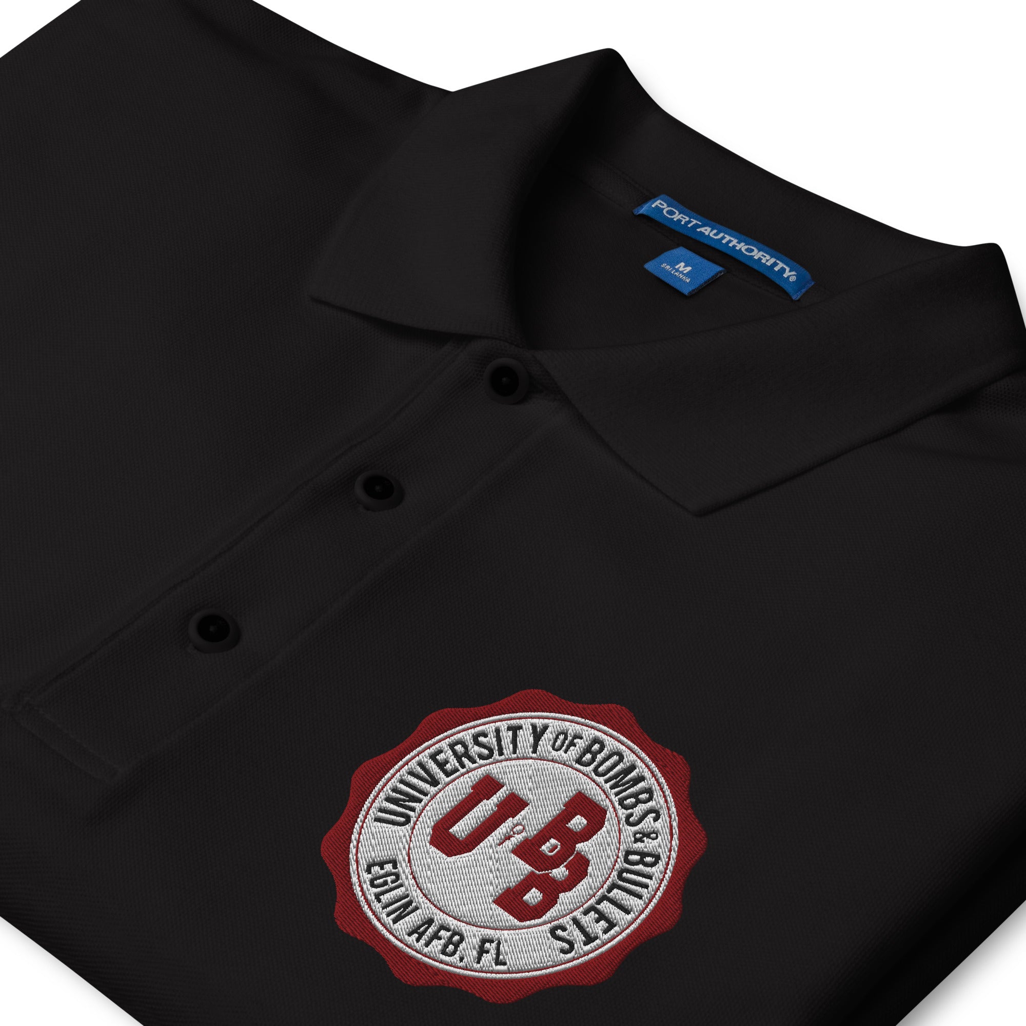 University of Bombs and Bullets Eglin premium polo