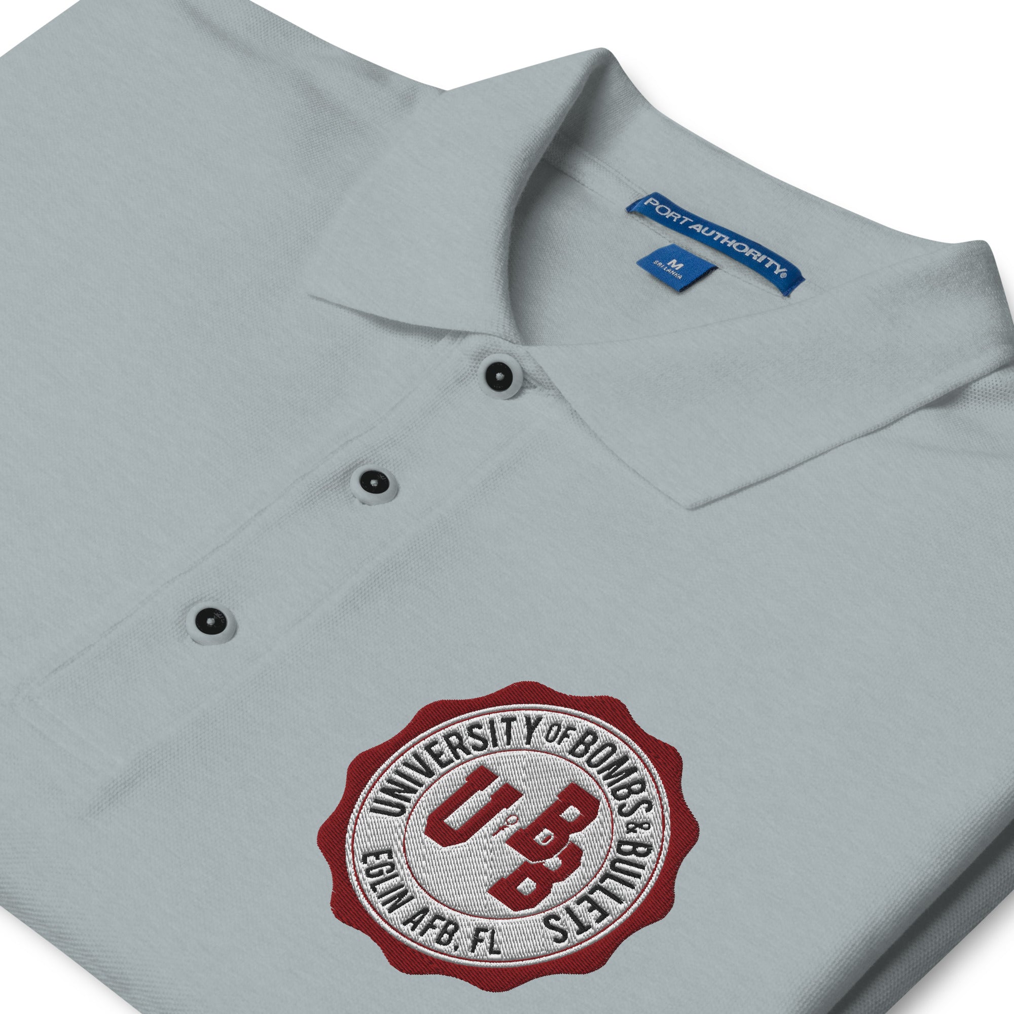 University of Bombs and Bullets Eglin premium polo